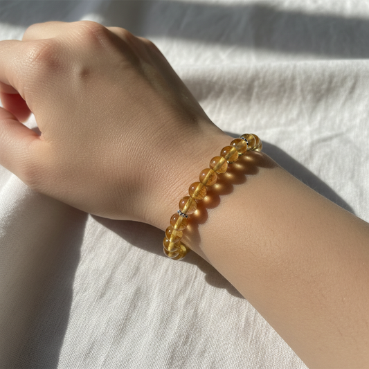 Citrine crystal bracelet worn on wrist - lifestyle shot