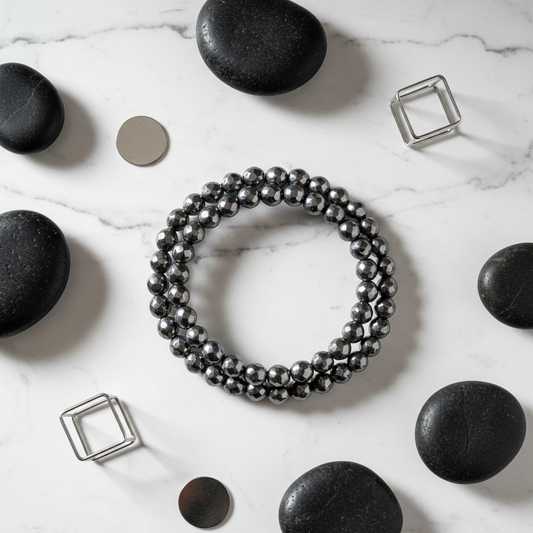 Hematite bracelet flat lay with black stones
