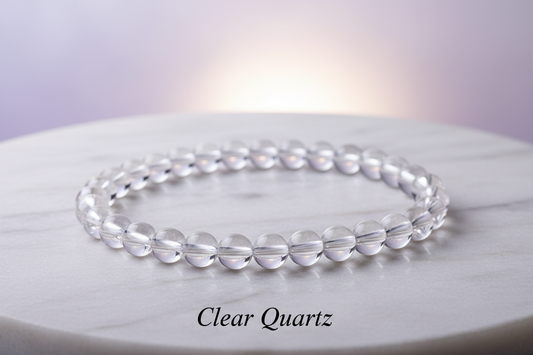 Sphatik crystal / clear quartz one bracelet in 8mm round beads on marble flat stand with soft holistic background with Clear Quatz written