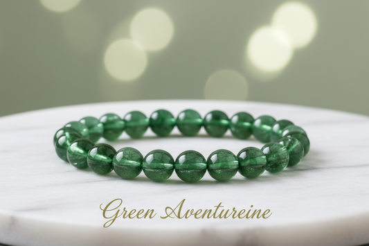 Green Aventurine crystal one bracelet in 8mm round beads on marble flat stand with soft holistic background with Green Aventurine written