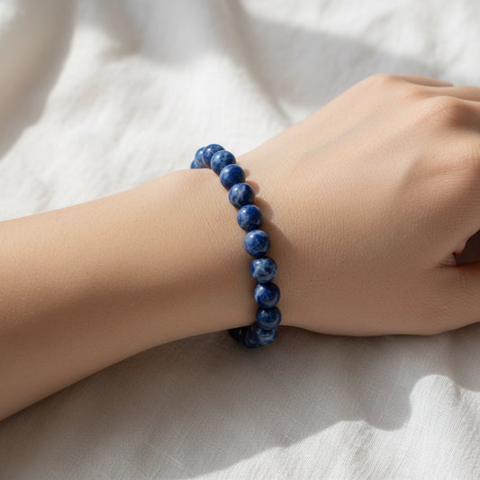 Sodalite crystal bracelet worn on wrist - lifestyle shot